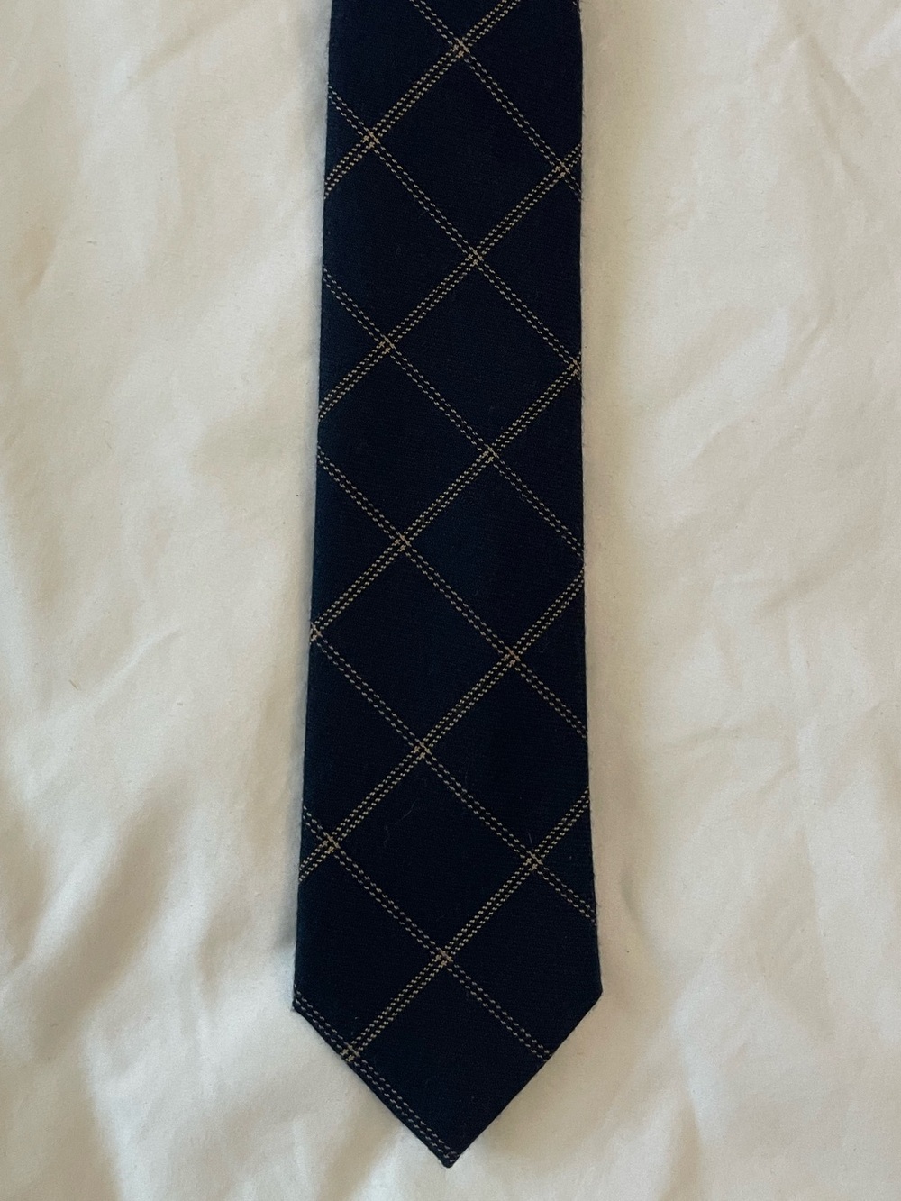The Tie Bar Navy Windowpane Tie with Gold Stitching